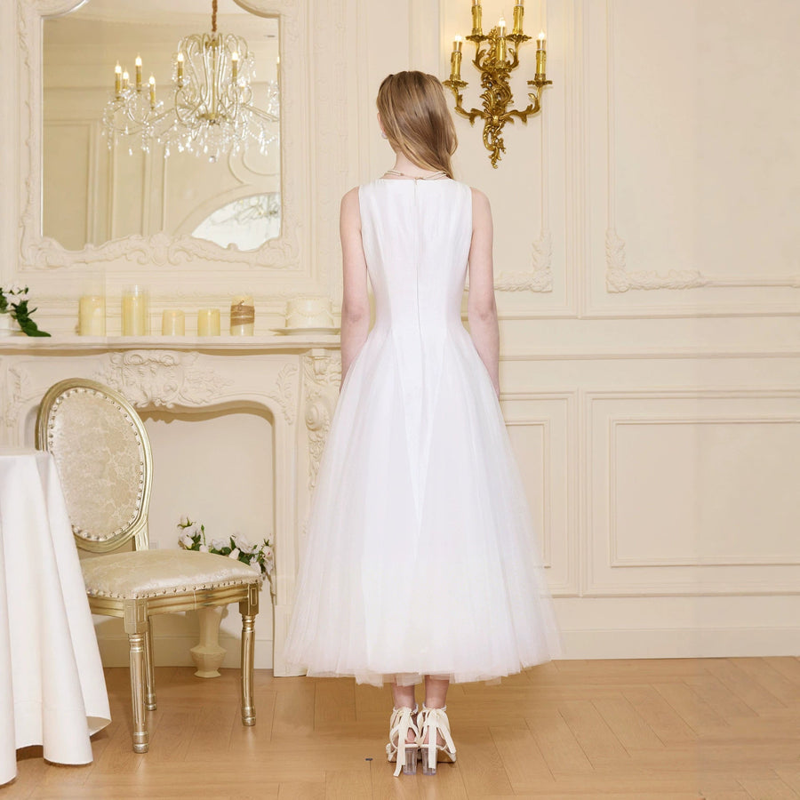 Elegant pink evening gown with fluid silhouette for formal events and celebrations