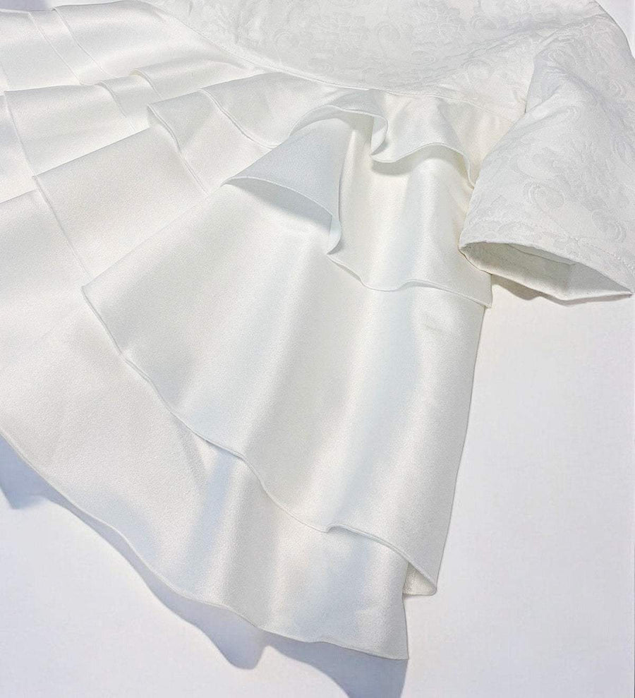 White vintage flower girl dress with jacquard satin bodice and layered tulle skirt for weddings and special occasions
