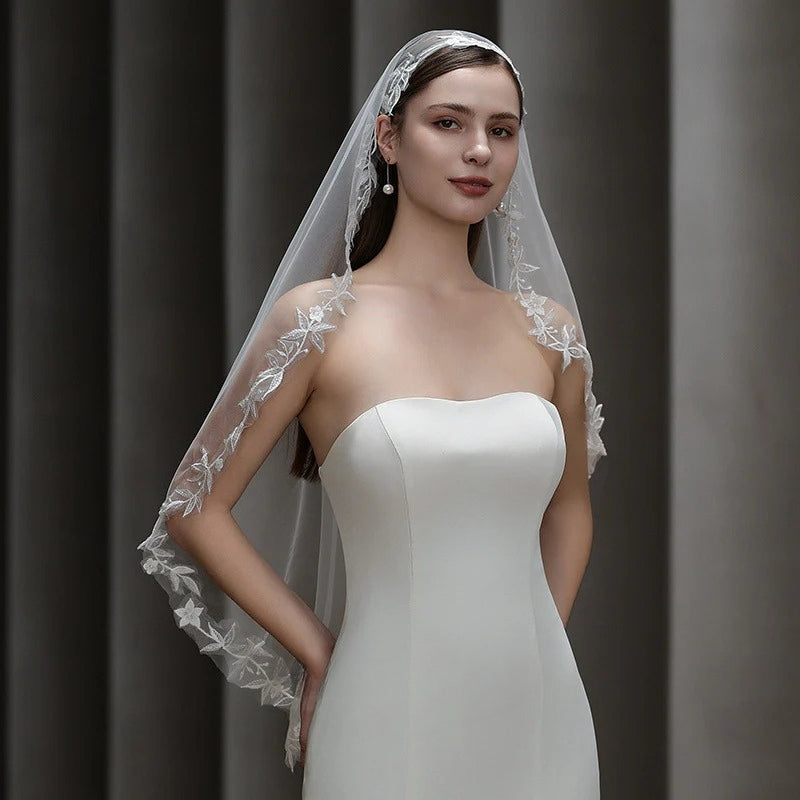 European vintage French lace bridal veil made of soft chiffon tulle and delicate mesh with a minimalist elegant design