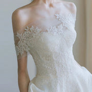 Elegant Celestia Lace Off-Shoulder Wedding Guest Dress with floral embroidery and satin skirt