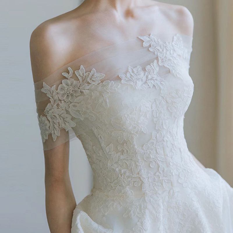 Elegant Celestia Lace Off-Shoulder Wedding Guest Dress with floral embroidery and satin skirt