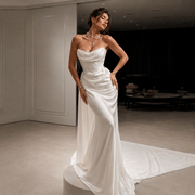 Elegant Celestial Drape Back wedding guest dress in flowing satin with minimalist strapless design