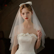 Double-layer mid-length bridal veil with satin ribbon bow made of soft chiffon tulle