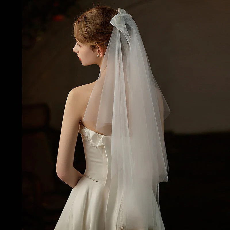 Double-layer mid-length bridal veil with satin ribbon bow and soft chiffon tulle