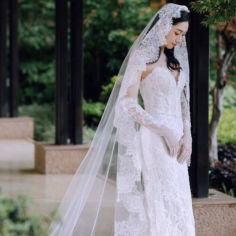 Black and white eyelash lace cathedral bridal veil with long wedding train on soft chiffon tulle