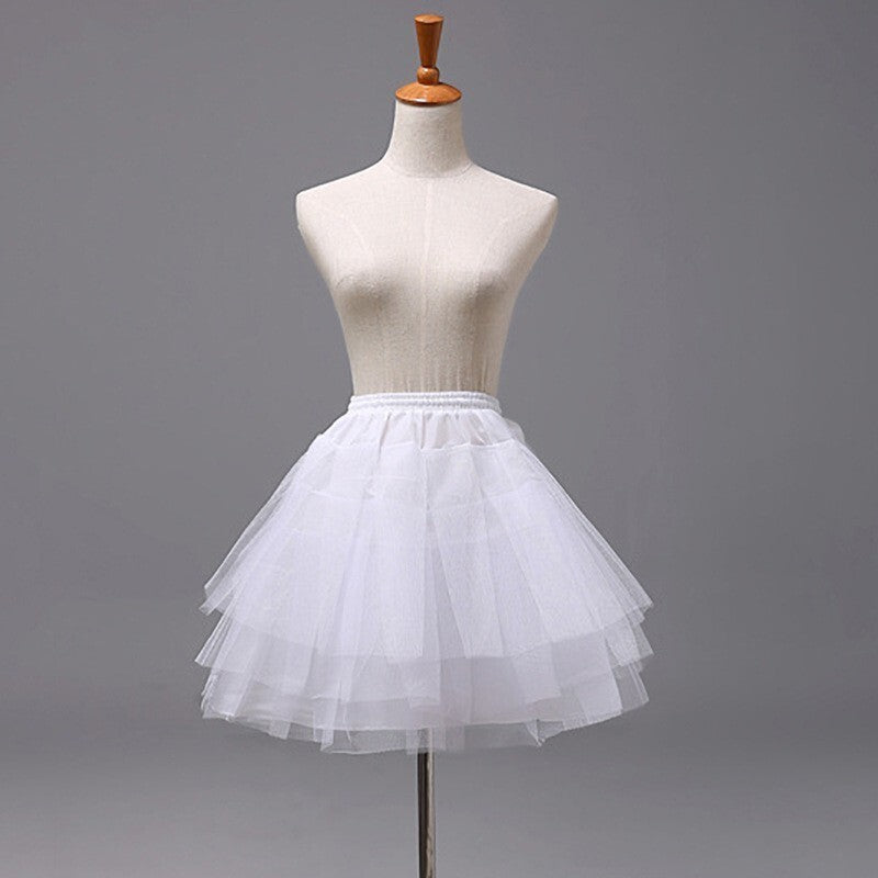 Girls White Petticoat short skirt in layered airy tulle, with a gathered elastic waistband and a full flared silhouette.