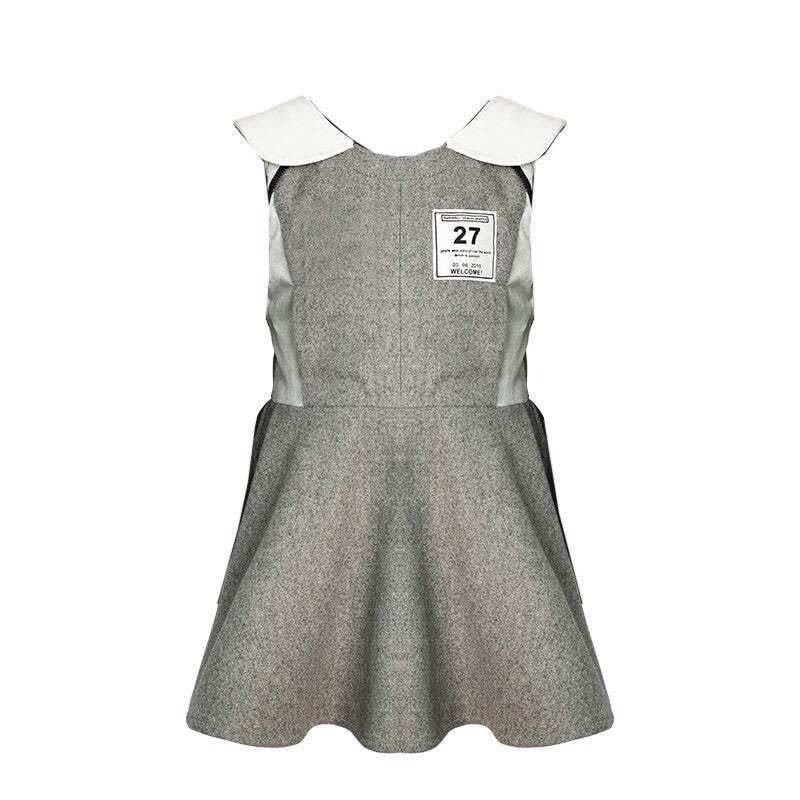 Girls Woolen Sleeveless Sporty Dress in grey wool-look fabric, with a flared skirt, white collar and chest patch.