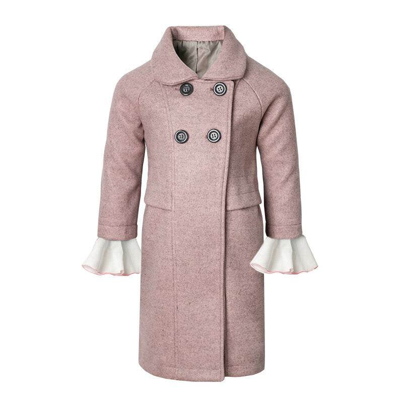 Girls' Woolen Winter coat in dusty pink wool, with a long double-breasted design, dark buttons and white flared cuffs.