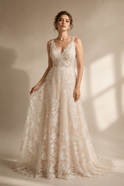 Ivory floral lace wedding dress with nude tulle and deep V neckline