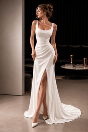 Ivory sculpted mermaid gown with square neckline and high slit for formal occasions