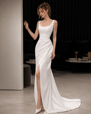 Ivory sculpted mermaid evening gown with square neck and high slit for formal occasions