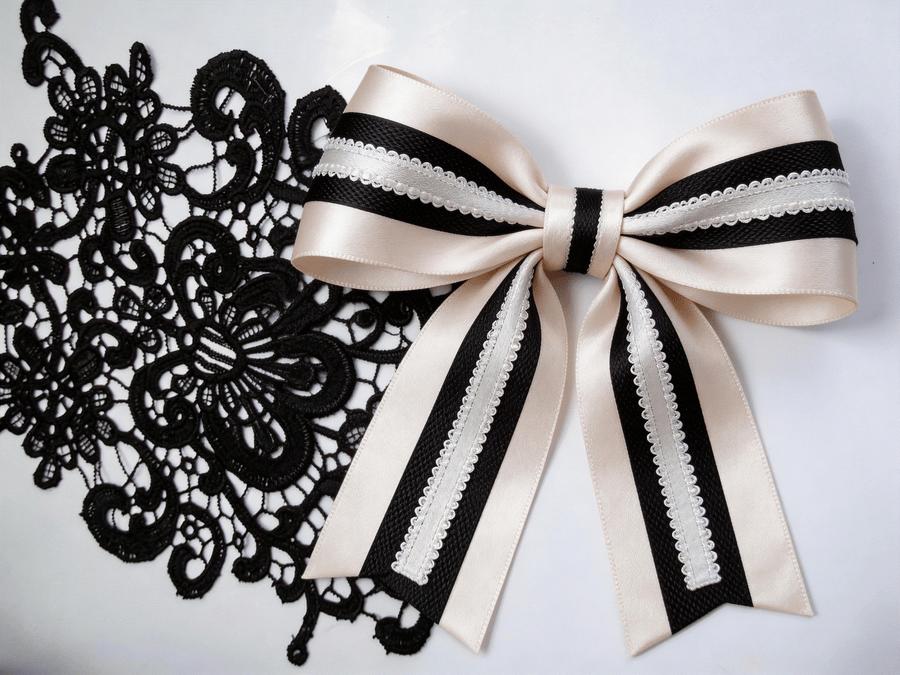 Vintage lace and satin ribbon set with black floral applique, baby pink satin, black woven ribbon, and white vintage lace trim for elegant weddings and gifts