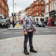 Kids Black Matte Leather Boots in black leather, with lace-up fronts, ankle-high shafts and chunky soles worn by a child