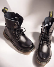 Kids Black Matte Leather Boots in black with a smooth finish, lace-up fronts, side zips and yellow stitching on thick soles.