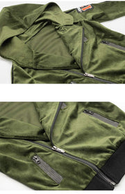 Kids' Velvet Blazer in olive green velour, featuring a hood, zip front, zip pockets and black ribbed hem
