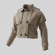Girls' Cotton Trench Coat in taupe cotton with a solid finish, double-breasted buttons, shoulder cape and buckled collar.